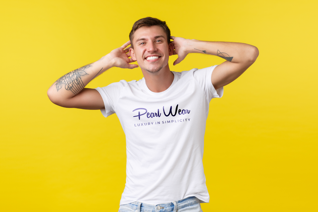 a man smiling with hands behind his head