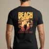 Beach Surf T-Shirt with a retro illustration of a girl holding a surfboard on the back.