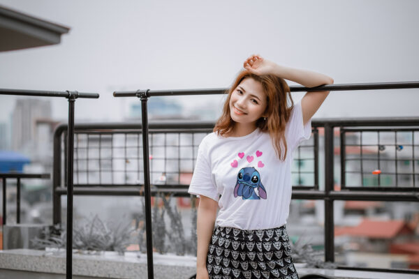 Cute Stitch Cartoon T-Shirt – Fun & Adorable Design Cute Stitch Cartoon T-Shirt with a Stitch and hearts print on the front.